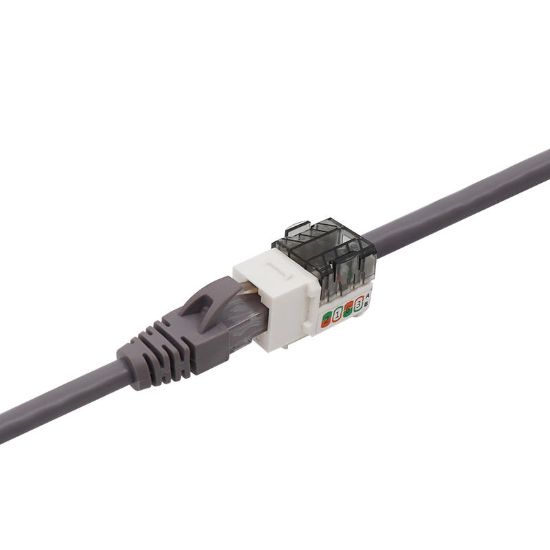 CAT6A UTP Tipo delgado Conector trapezoidal perforado de 90 grados